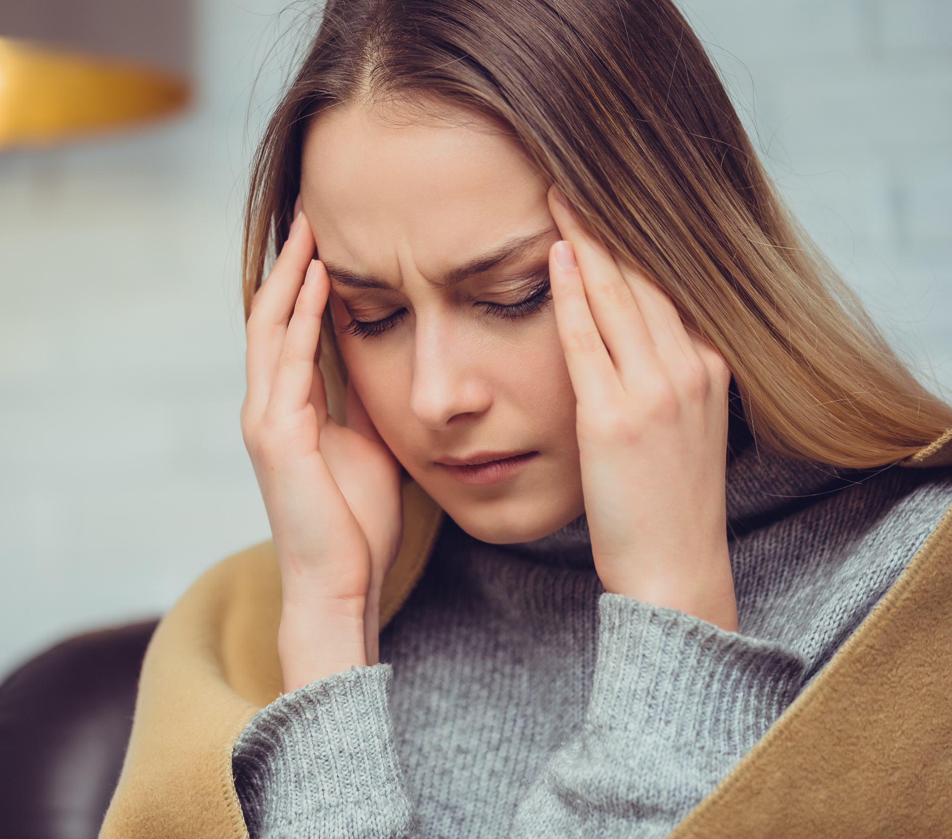 Lady with serious headache